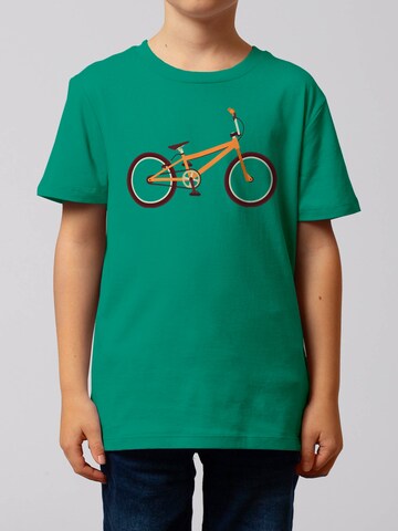 watabout.kids T-Shirt 'BMX' in Grün