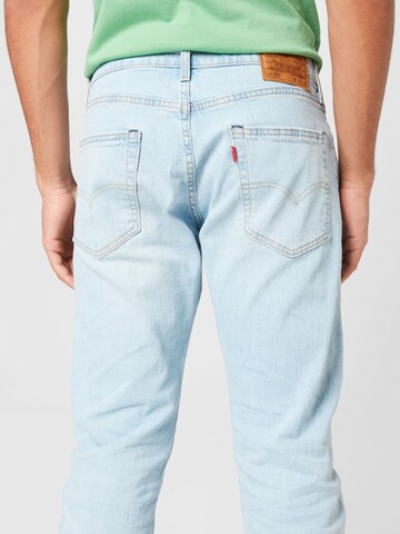 LEVI'S ® Avsmalnet Jeans '502™ Taper' i blå