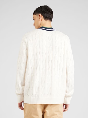 Pull-over Tommy Jeans en blanc