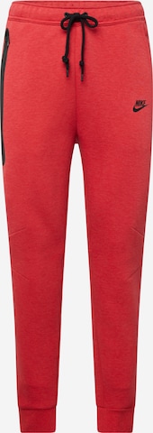 Nike Sportswear Püksid 'TECH FLEECE', värv punane: eest vaates