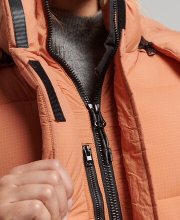 Manteau d’hiver 'Touchline' Superdry en orange