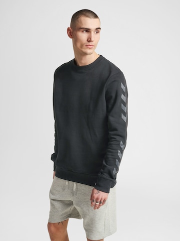 Hummel Αθλητική μπλούζα φούτερ σε μαύρο: μπροστά