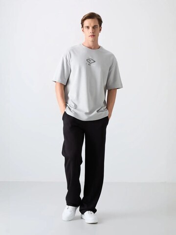 T-Shirt 'T-Shirts' Tommy Life en gris