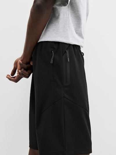 Pantaloni Pull&Bear di colore nero, Visualizzazione prodotti