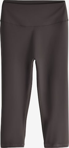 self. Skinny Sports trousers in Brown: front