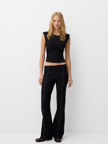 Flared Pantaloni di Bershka in nero