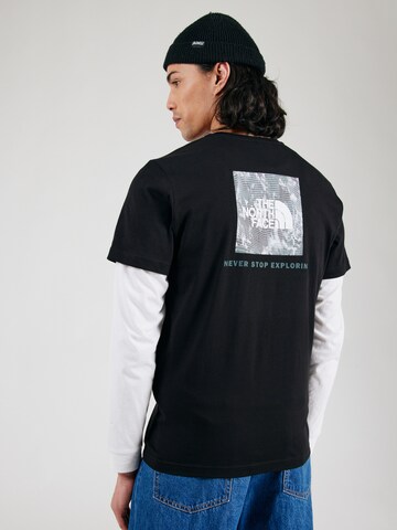 THE NORTH FACE - Camiseta 'Tailgrid Infill' en negro: frente