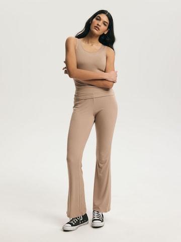 ESOTIQ - Acampanado Pantalón 'Haushose Schlaghose Viskose Mix weich bequem elastischer Bund Clear' en beige