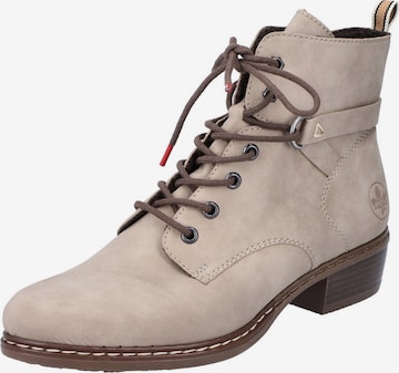 Bottines à lacets Rieker en beige : devant