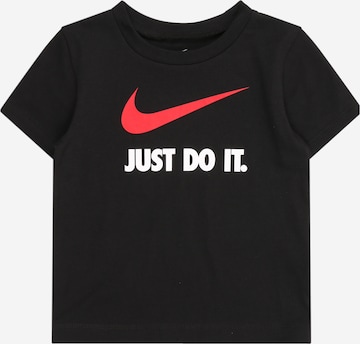 T-Shirt 'Swoosh' Nike Sportswear en noir : devant