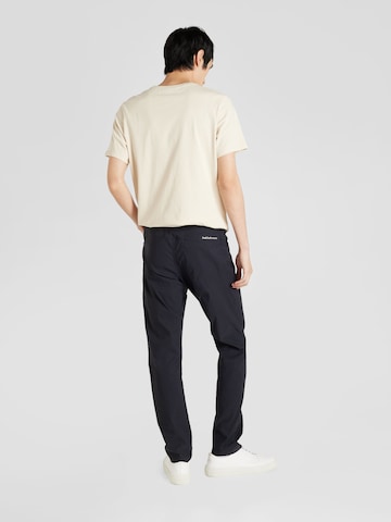 PEAK PERFORMANCE Slimfit Outdoor hlače | črna barva