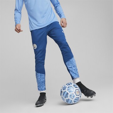 Effilé Pantalon de sport 'Manchester City' PUMA en bleu