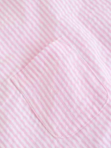 Set de la Next pe roz