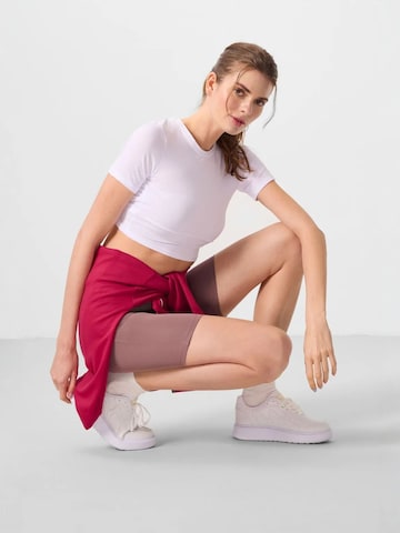 Tommy Life - Tapered Leggings 'Gamaschen' em roxo: frente