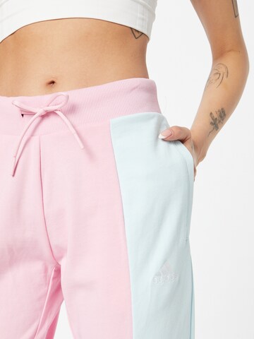 ADIDAS SPORTSWEAR Tapered Workout Pants 'Essentials Colorblock' in Pink