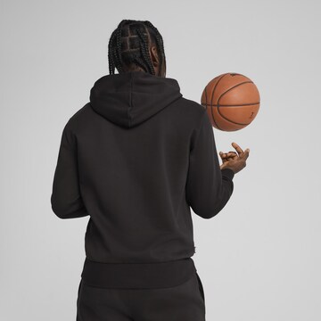 Sweat de sport 'Posterize' PUMA en noir