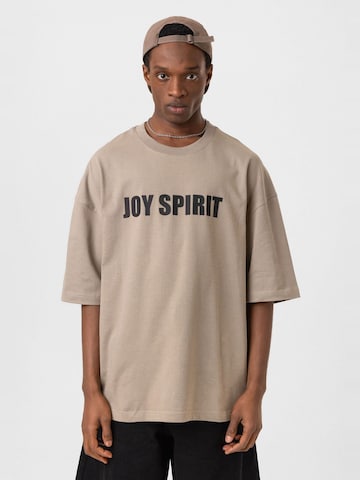 Tricou 'Bouzo' de la Dandalo pe bej: față
