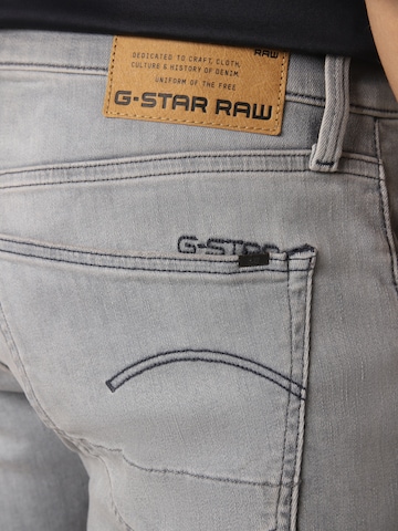 pelēks G-Star RAW Piegulošs Džinsi