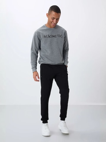 Sweat-shirt Tommy Life en gris