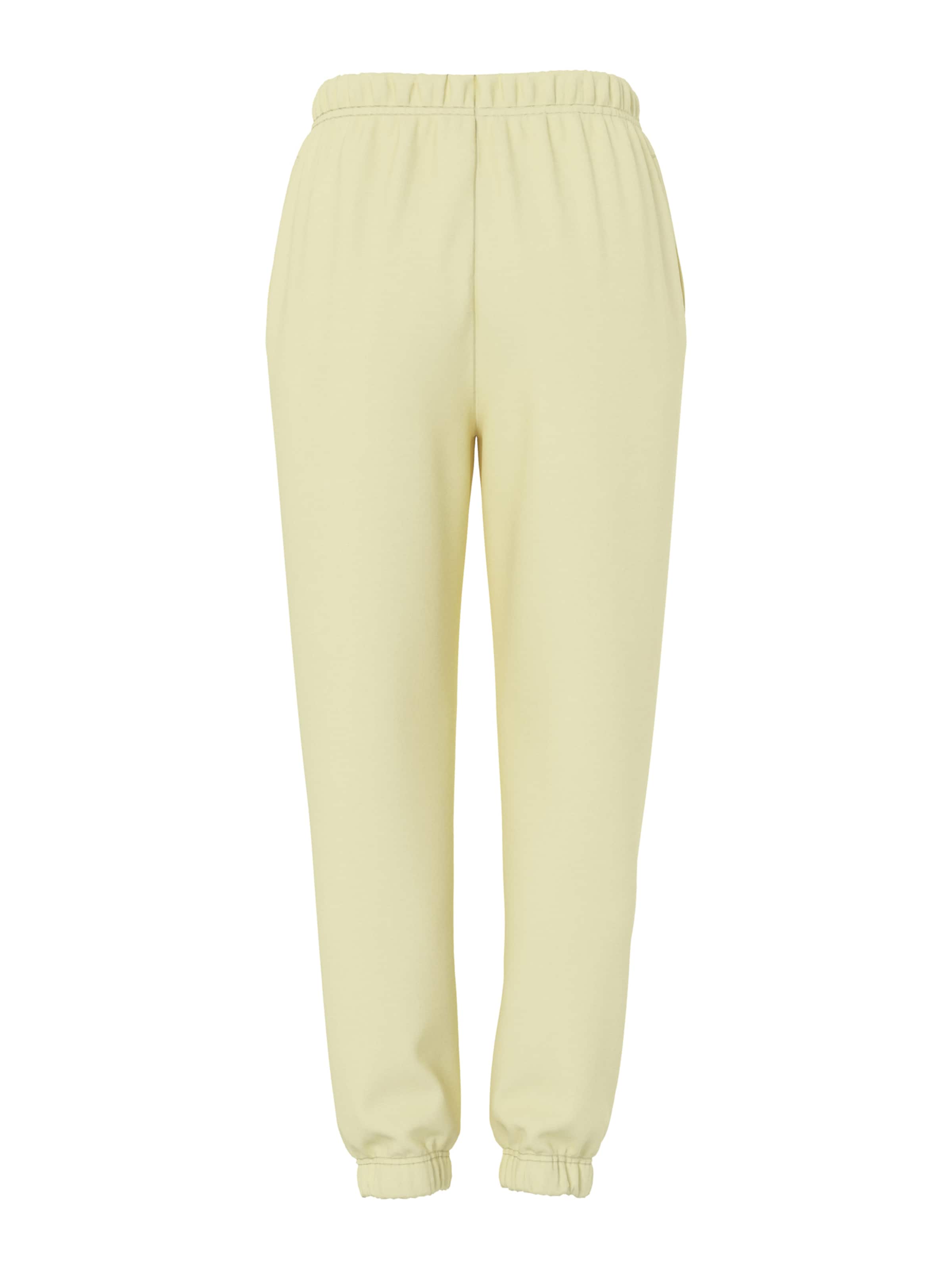 PIECES Tapered Trousers 'PCCHILLI' in Yellow