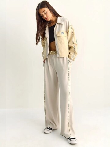 Pantalons de tailleur Bianco Lucci en beige