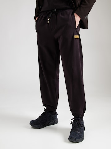 Tapered Pantaloni di Versace Jeans Couture in nero: frontale