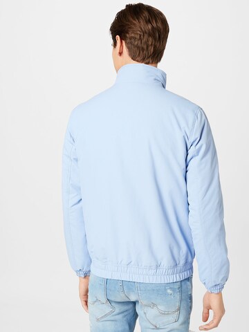 Tommy Jeans Jacke 'Essential' in Blau