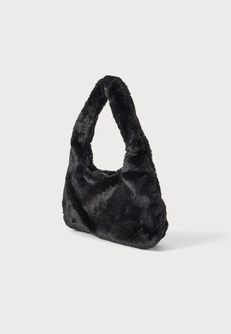 PUMA Schultertasche in Schwarz