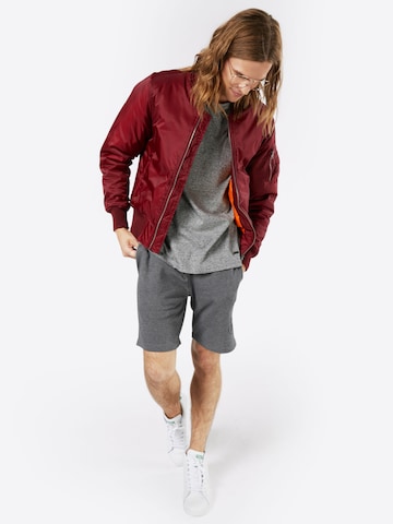 Veste mi-saison Urban Classics en rouge