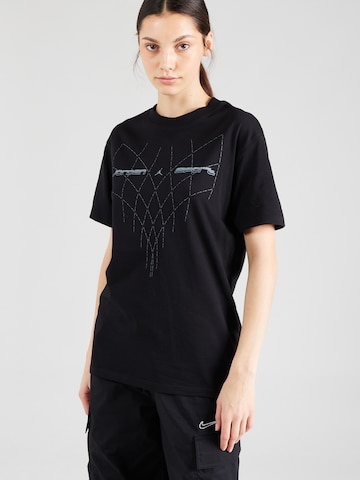 T-shirt fonctionnel Jordan en noir : devant