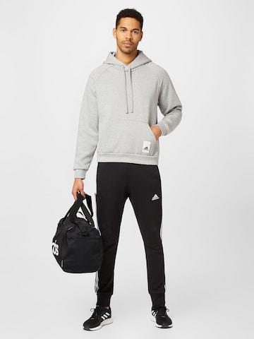 ADIDAS SPORTSWEAR Tapered Workout Pants 'Essentials' in Black