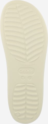 Crocs - Zapatos abiertos en beige