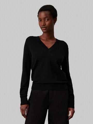 Pull-over Calvin Klein en noir : devant