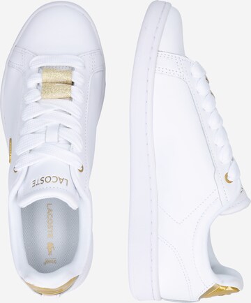 Baskets basses LACOSTE en blanc