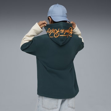 PUMA Sweatshirt 'MID90s Layered' in Green