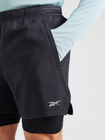 Regular Pantalon de sport Reebok en noir