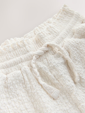 Next Wide Leg Housut värissä beige