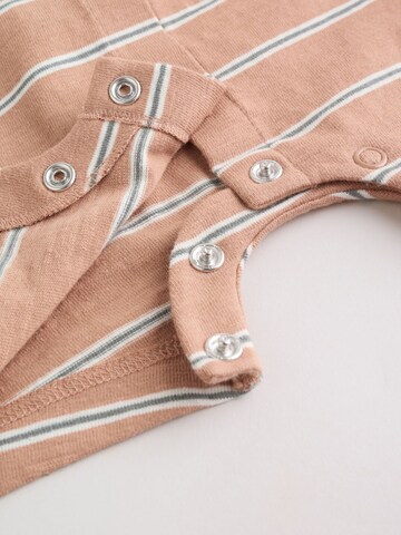 Next Sparkdräkt/body i beige