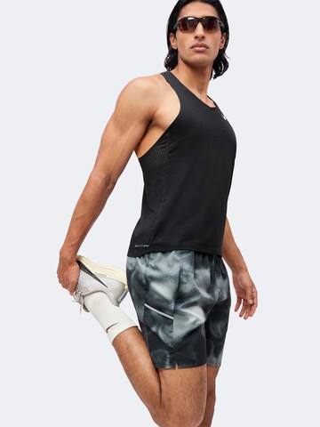 NIKE Regular Sportbroek 'Miler' in Zwart