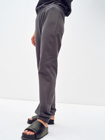 ABOUT YOU x Toni Garrn Regular Pants 'Kim' in Grey