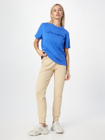 Champion Authentic Athletic Apparel Tapered Broek in Bruin