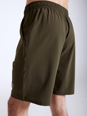 Regular Pantalon de sport 'Shorts' SPORTKIND en vert