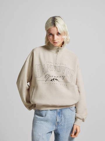 Sweat-shirt Bershka en beige : devant