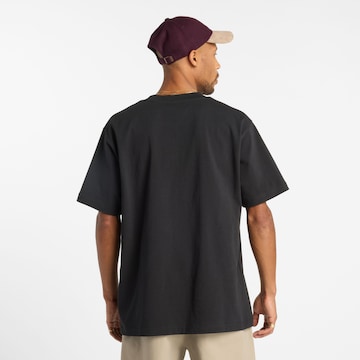 new balance Shirt 'Numeric' in Zwart