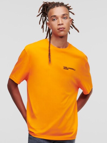 KARL LAGERFELD JEANS - Camiseta en naranja: frente