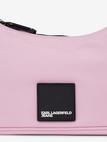 KARL LAGERFELD JEANS Torba za čez ramo 'Urban' | roza barva