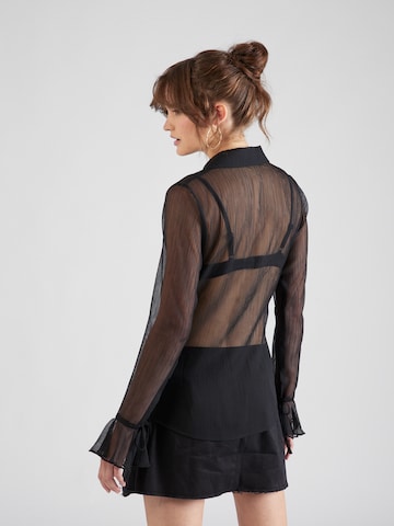 millane - Blusa 'Malea' en negro