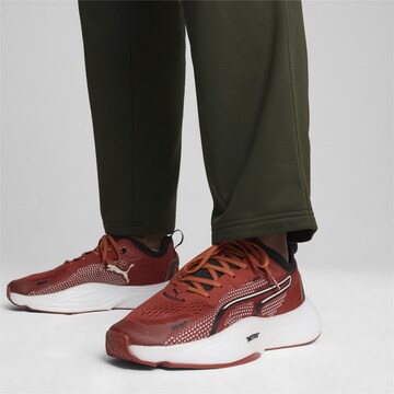 PUMA Sportschoen in Bruin