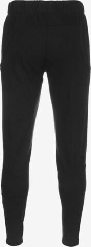 UNDER ARMOUR Regular Workout Pants 'Curry' in Black