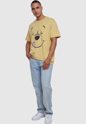 MT Upscale Paita 'Disney 100 Winnie Pooh Face' värissä keltainen
